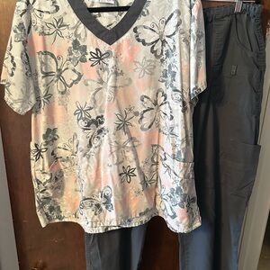 Uniform Advantage Floral & Butterfly V-Neck Scrub Set in Pink and Gray